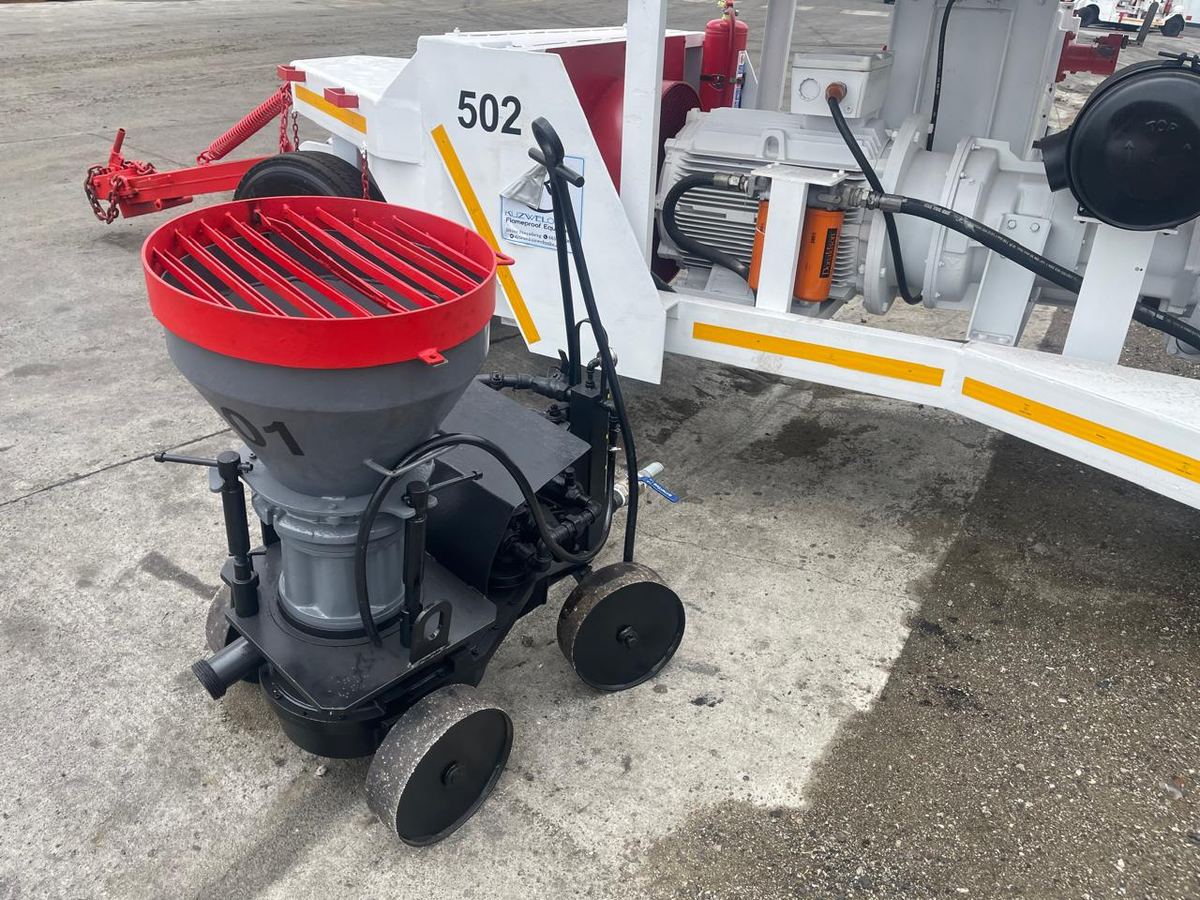 Stonedust gunning machine coupled to flameproof compressor unit 502